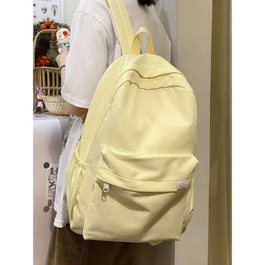 Hua Xi genuine When I Fly to You Su Zaizai same style bag milk yellow backpack college student backpack female school bag