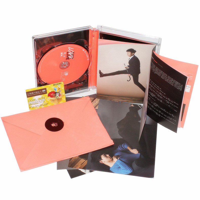 正版 张杰 爱不解释2013专辑 CD+4张明信片+写真歌词本+2卡贴
