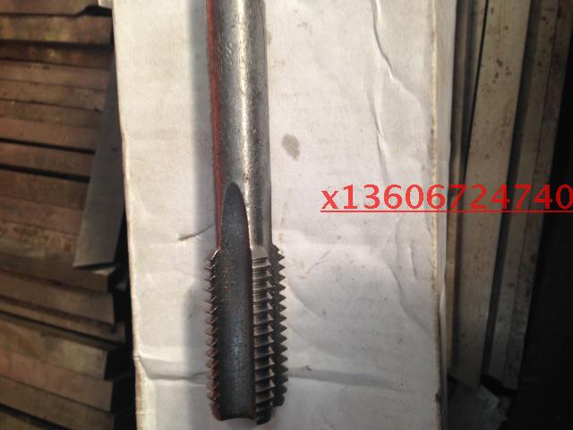 The old machine used screws to tap M24