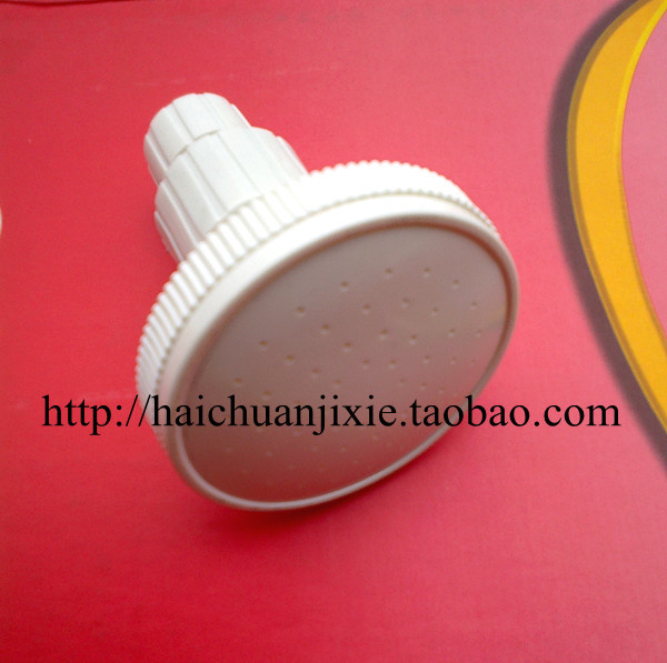 Shower nozzle head rotates shower spray nozzle