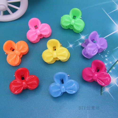 Children's headgear Small Catch Clip Small Girl Candy Color Butterfly Knot Mini small Fat Grip Claw Clip of the Sea Clip
