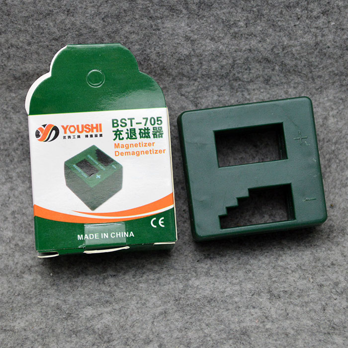 A demagnetomer screwdriver with a magnetic screwdriver