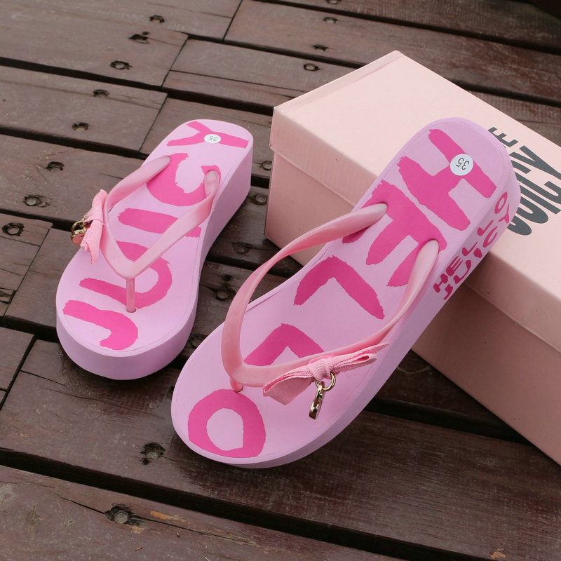 Summer women's flip-flops Korean version trend wedge heel clip-on beach shoes asymmetric graffiti thick bottom sandals women