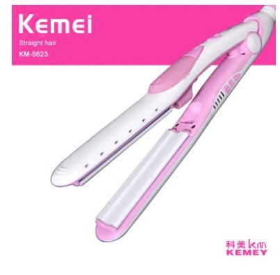 Shenzhen Yun cross - border boutique domestic cargo straight hair splinter manufacturer direct sales KM5623 electrical stone ceramics