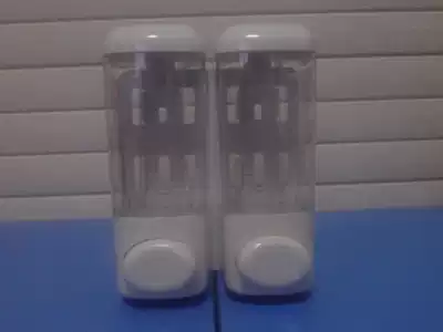 New button hotel bathroom wall-mounted dispenser double-headed manual plastic hotel powder room bath shampoo box