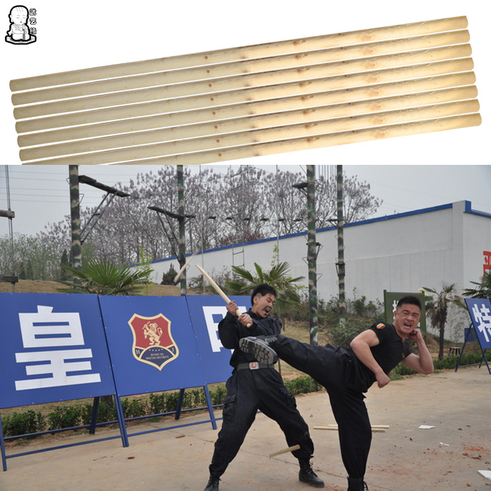 Martial arts performing Qigong stick kickwondo performing hard qigong performing Yang Mu Kai stick