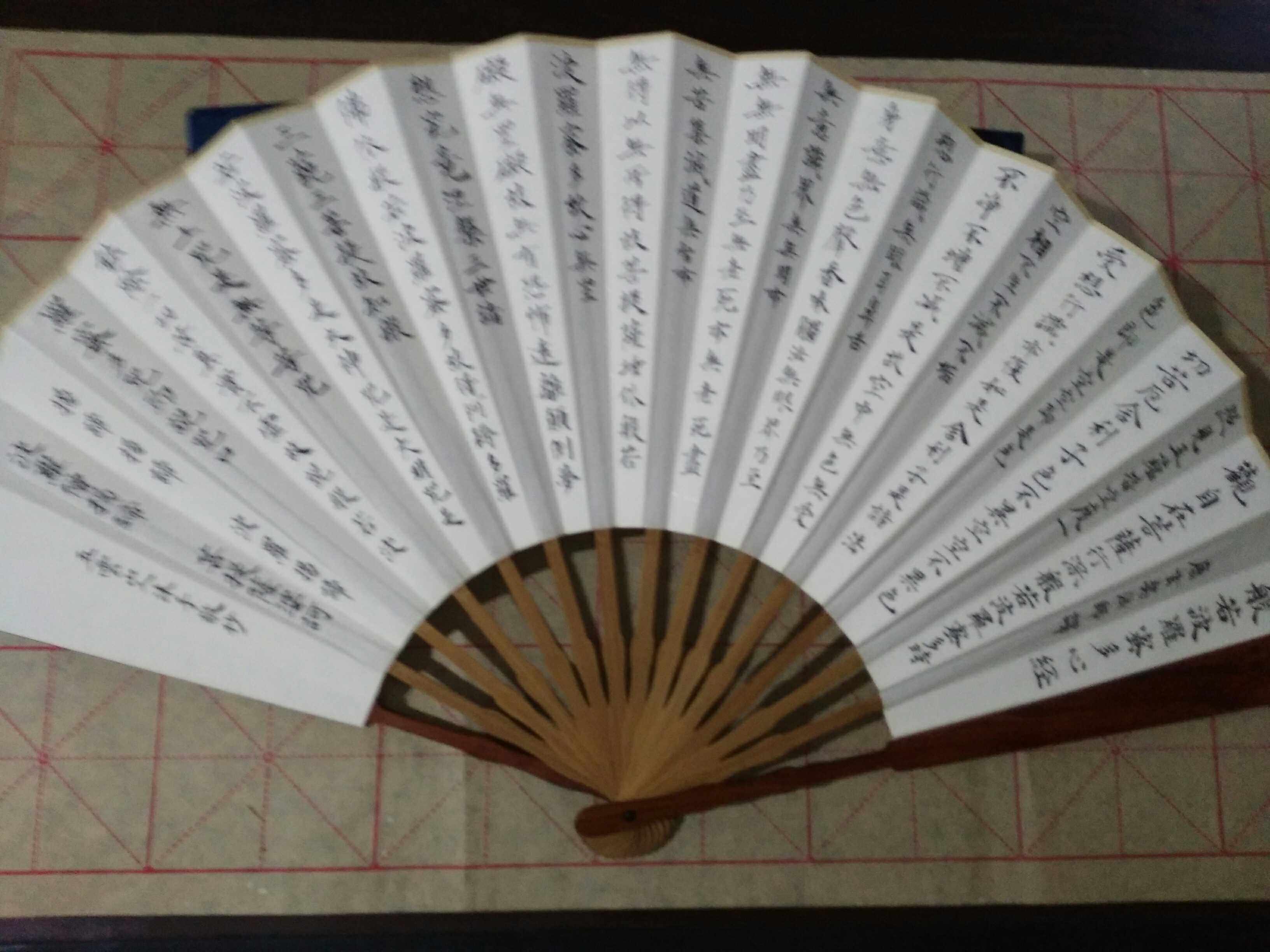 Handwritten heart warp paper fan Wuyunshan People's pro-written book Law True Calligraphy Red Wood Umu Folding Fan matching box
