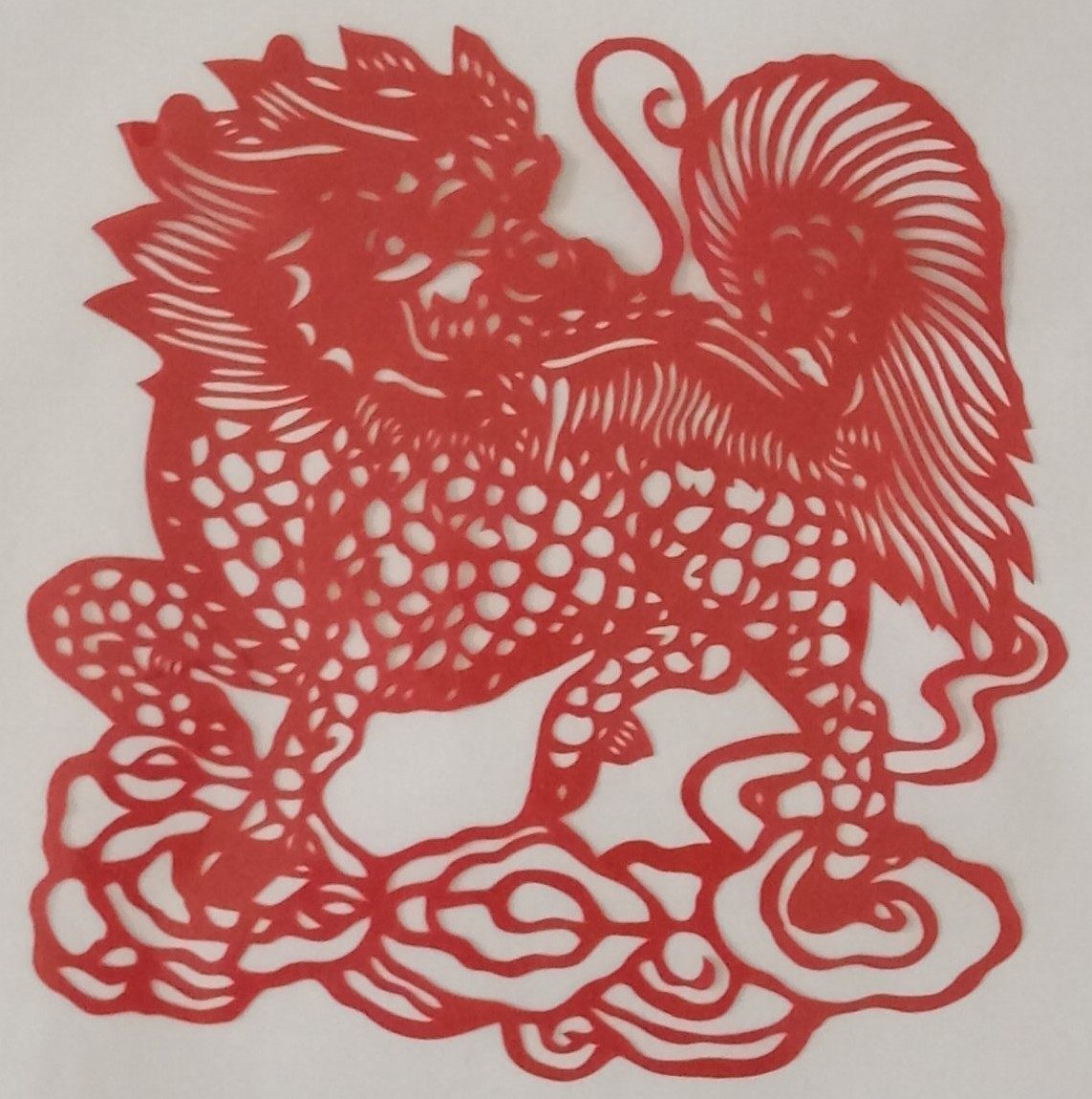 Kirin paper-cut painting window decals pure handmade paper-cut decorative painting traditional art A4 paper to send foreigners gift red paper