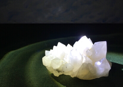 A picture of a thing has been emerging from the crystal cluster round