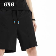 Quần áo nam GXG [Xin Shang] mùa hè thời trang nam kinh doanh đô thị phổ biến màu đen giản dị quần short lỏng năm quần - Quần short