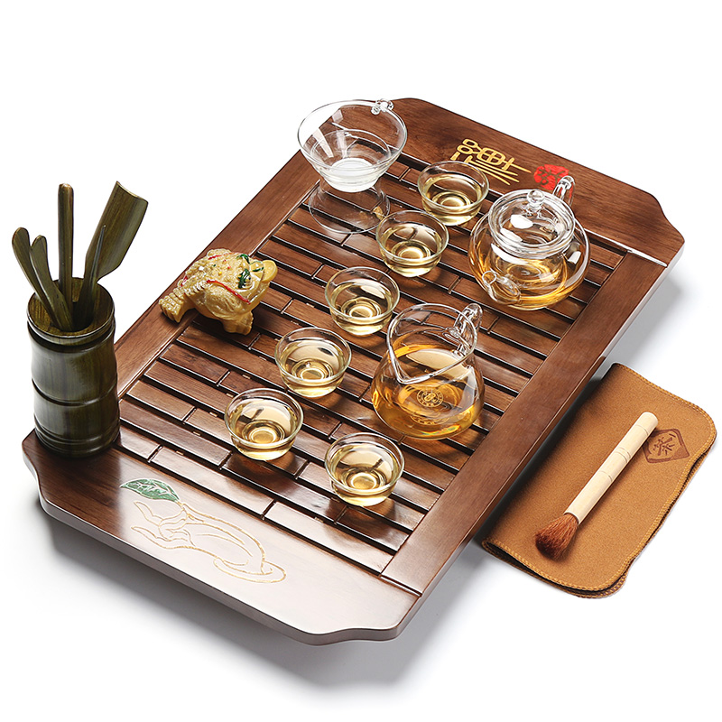 Xin arts edge of a complete set of kung fu tea tea tray was solid wood tea saucer home outfit purple sand tea set