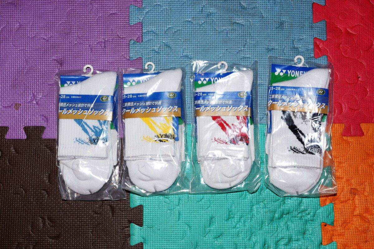 The price of badminton socks YY is the price of a pair