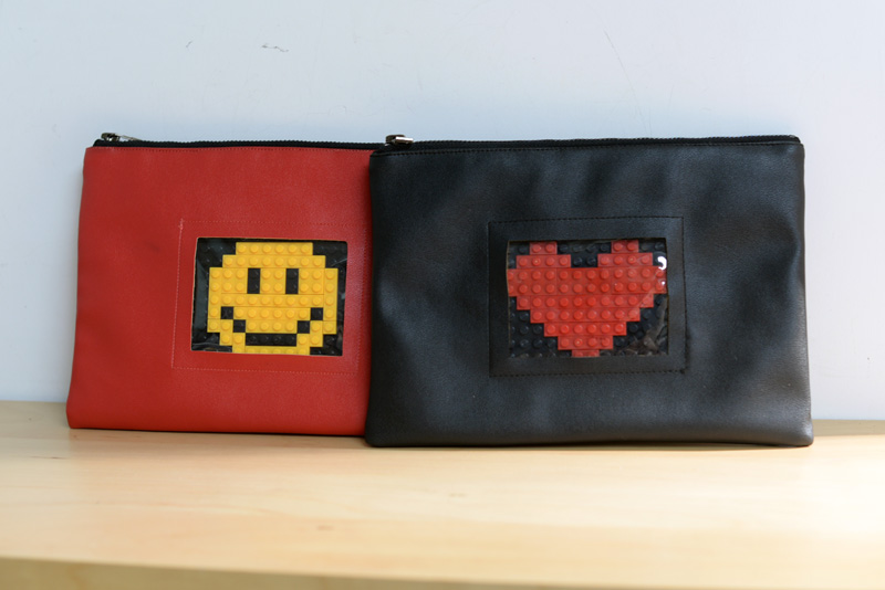 Tide Tutorial] Original design transparent hollowed-out toy building block splicing cartoon graphic pattern PU hand holding bag