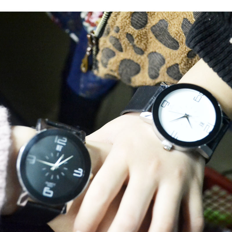 Korean version of the retro tape waterproof simple student watch fashion trend quartz men's table female form a couple of tables