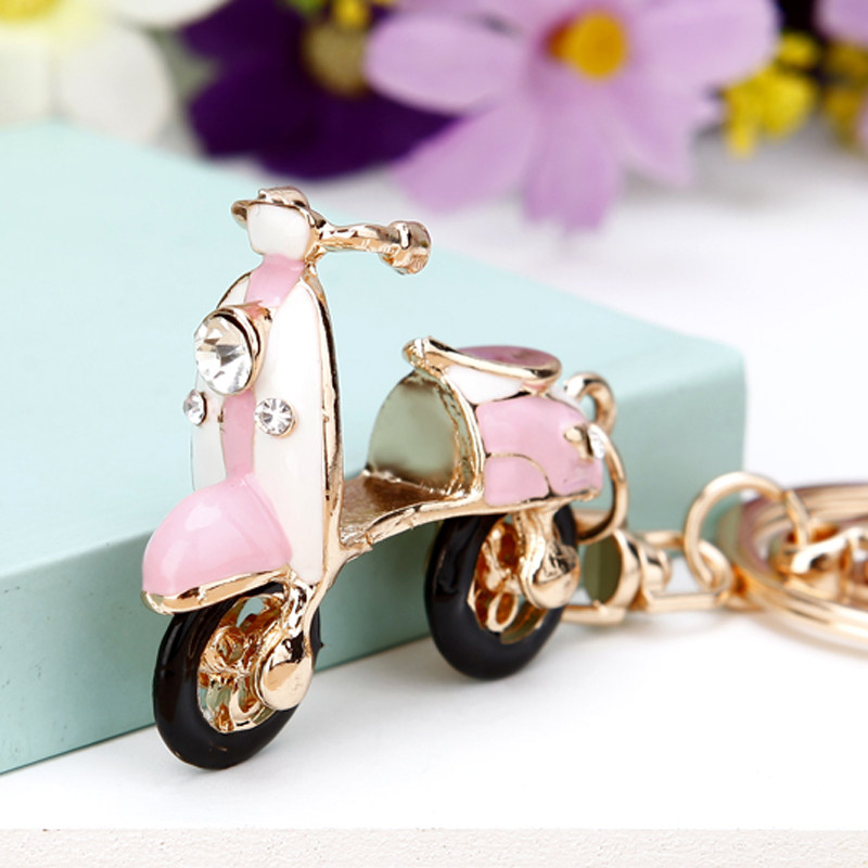 Korean creative gift Rhinestone motorcycle car keychain Female cute net red ins bag pendant key chain ring