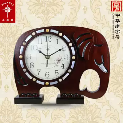 Creative fashion mute elephant wooden clock bedroom decoration mute living room Polaris auspicious small seat clock