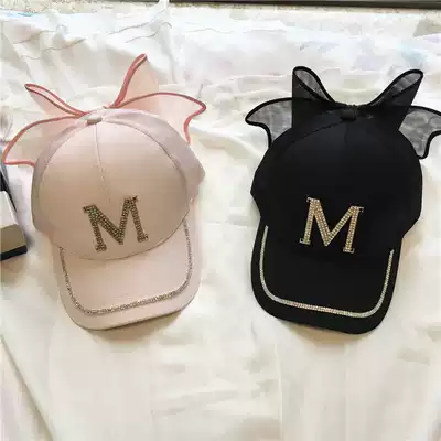 The new Korean version of the spring and autumn diamond-encrusted M letter bow visor cap rhinestone mesh wild hip-hop baseball cap