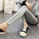 Quần legging cotton YAYI 2018 mùa thu mới màu trắng hai dây mặc thể thao quần lọt khe bên chân quần tây baggy Quần tây thường
