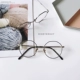 Kim loại siêu nhẹ hình bầu dục khung phẳng gương nữ nghệ thuật retro nhỏ kính tươi khung nam không gây dị ứng mặt nhỏ thủy triều