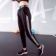 Quần thể thao rộng rãi thoải mái nữ nhanh khô quần thể dục thoáng khí thể thao yoga chạy đào tạo quần mùa thu và mùa đông Quần thể thao