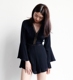TANSSHOP khí chất nữ thần mùa hè tay áo kèn V-cổ ren lớn backless giảm béo jumpsuit quần short jumpsuit nữ quần đùi nữ đẹp Quần short