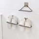 Rèn sắt giá treo tường hình tam giác keo dán giày đơn giản kệ phòng khách phòng tắm phòng tắm dép lưu trữ giá - Kệ khung sắt trang trí Kệ