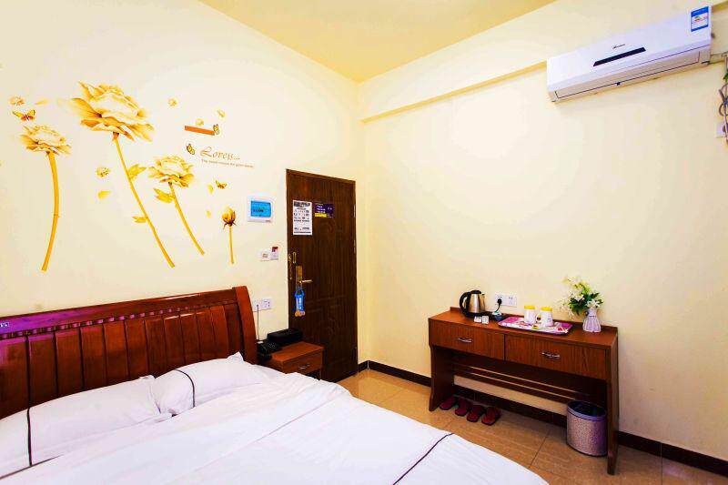 Guangzhou Jiuding Xinghao Hotel Business Big Bed Room