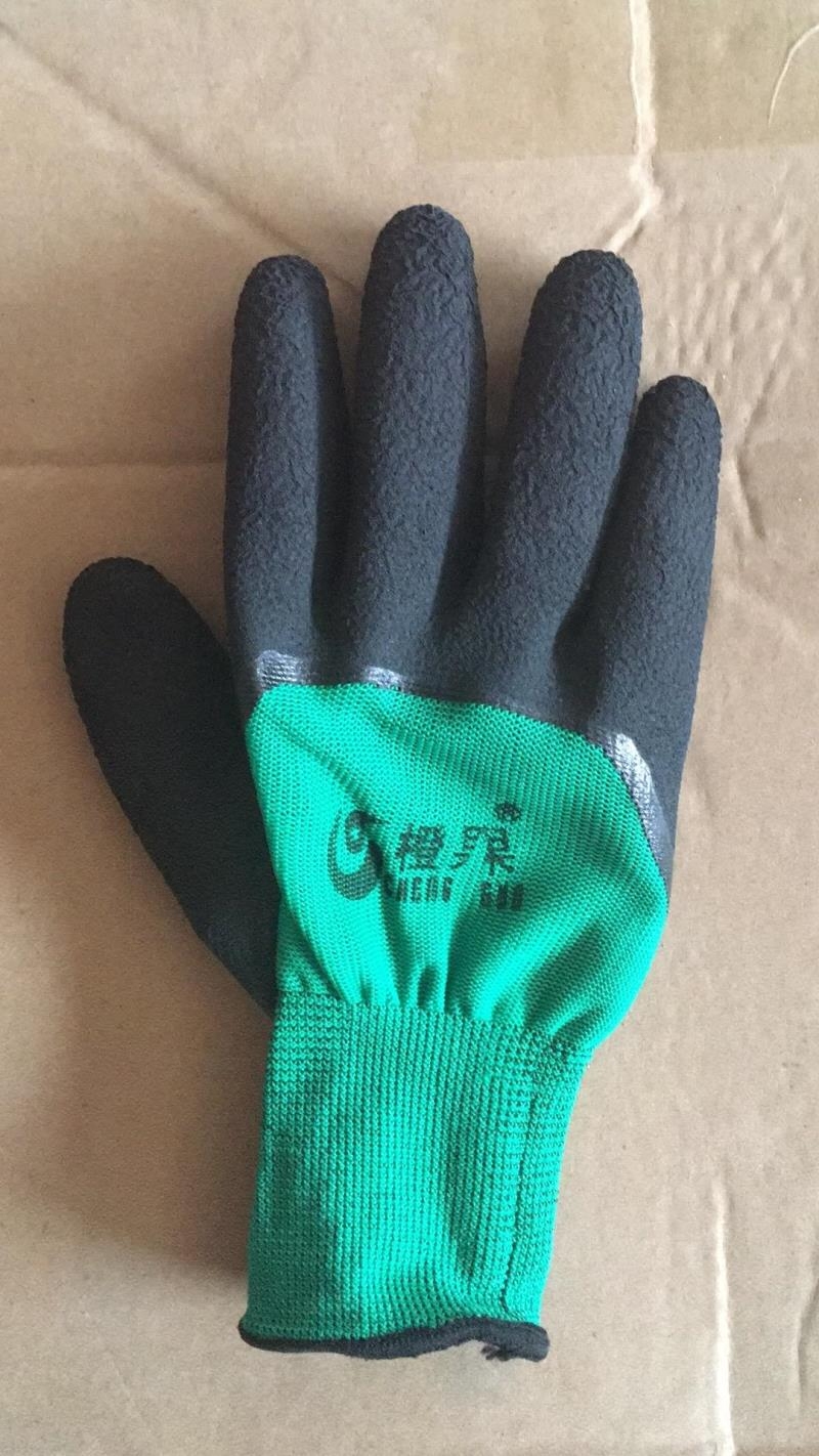 Orange-fruit hanging rubber gloves on the other hand