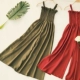 Váy dài bãi biển hè 2018 mới xếp li ống tai bằng gỗ trang trí nút cao eo thon cao chân rộng quai jumpsuit 	váy tôn eo	 Váy eo cao