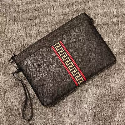 Street trend boys handbag Korean version of Chinese style striped stitching clutch soft leather casual clutch clutch