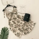 Bali bãi biển váy V-Cổ bow sexy leaky slim sling Một từ đu lớn bên bờ biển kỳ nghỉ ăn mặc nữ