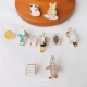 Một phiên bản Hàn Quốc của mô hình dễ thương mọc lên thỏ trâm Han Feng phim hoạt hình cá tính Sen huy hiệu hoang dã pin