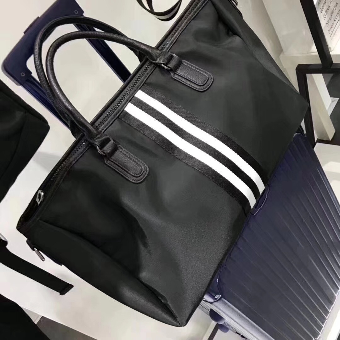 Korean version Black and white strip Coloured canvas matched genuine leather travel bag Female hand large capacity Travel baggage bag 17451