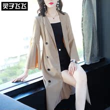 灵子飞飞欧美潮流新品翻领双排扣纯色喇叭袖收腰长款打底女风衣图片