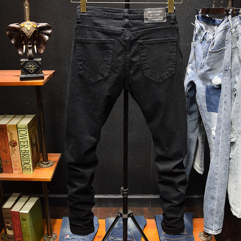 膝盖大破洞牛仔裤男黑色弹力修身小脚韩版学生