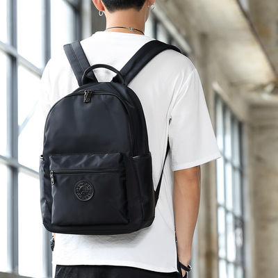 男士帆布双肩包韩版潮休闲背包学生书包电脑包防水尼龙包旅行背包