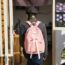 可爱蝴蝶结绑带学院风双肩包 简约时尚纯色书包休闲旅行百搭背包