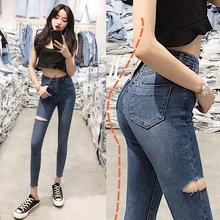 漫步美库网红高腰侧边破洞牛仔裤女韩版显瘦性感露大腿小脚九分裤