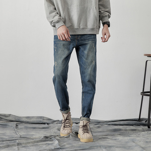 复古做旧水洗磨破牛仔裤