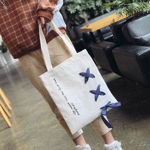 韩版原创丝带款休闲帆布包