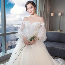 婚纱2018新款浅香槟泡泡袖公主梦幻新娘婚纱欧美显瘦轻婚纱森系