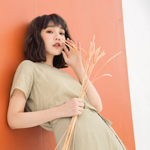 桔熊优惠春夏装简约亲肤后排扣透肤圆领短袖上衣女大码AB5861图片