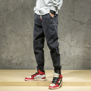 春季百搭牛仔裤男宽松休闲弹力小脚裤潮牌束脚哈伦裤大码黑色青年