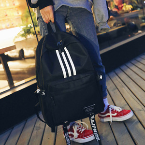 欧美风双肩包男大容量情侣背包