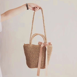 日系度假蝴蝶结手提草编包