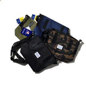 途冠单肩包男休闲帆布斜挎包胸包男包学生背包